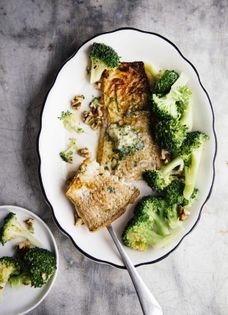 Bright green broccoli with seared whitefish and lemon butter