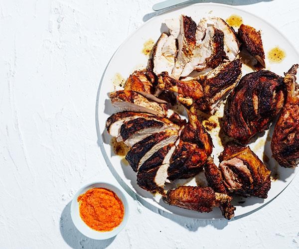 Brined barbecued turkey with spices and piri piri sauce