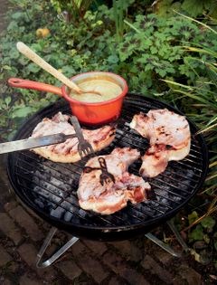 Brined pork chops with sweet mustard barbecue sauce