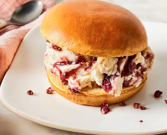 Brioche ice cream sandwich with raspberries