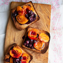 Brioche toast with grilled apricots and blueberries