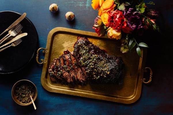 Brisket with pomegranate-walnut sauce and pistachio gremolata 