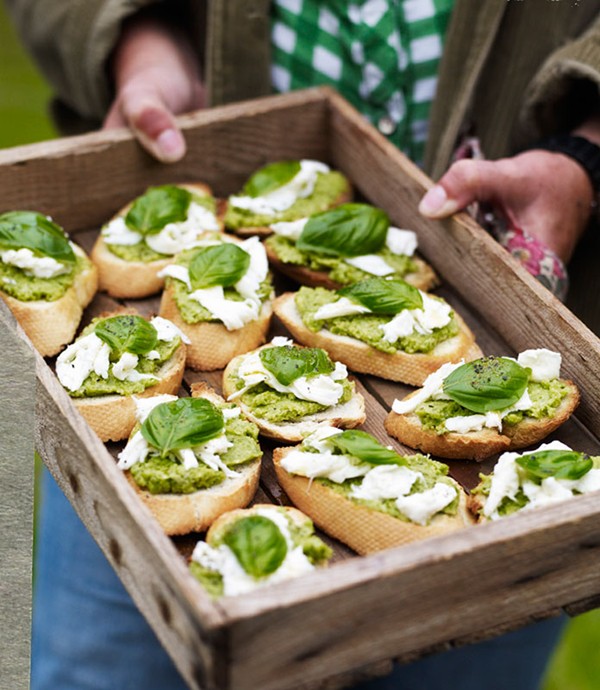 Broad bean paté on toast with torn mozzarella, basil, and lemon oil