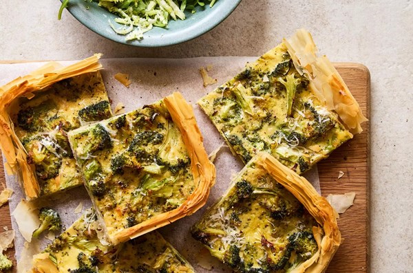 Broccoli and anchovy tart with raw shaved broccoli salad
