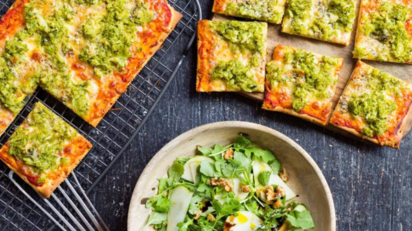 Broccoli and blue cheese pizzas with rocket and pear salad