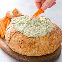 Broccoli dip in a bread bowl
