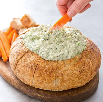 Broccoli dip in a bread bowl
