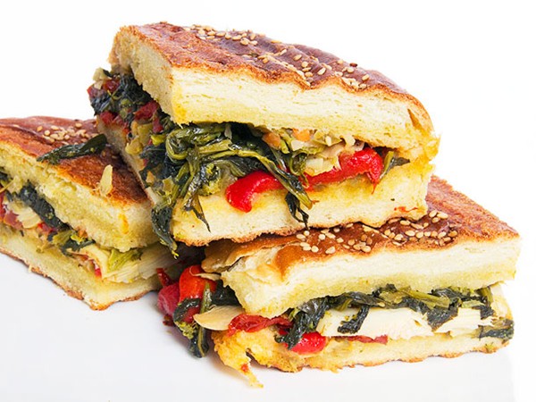 Broccoli rabe and antipasti panini with olive salad