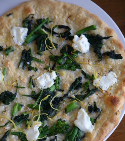 Broccoli rabe, goat cheese, and lemon zest pizza