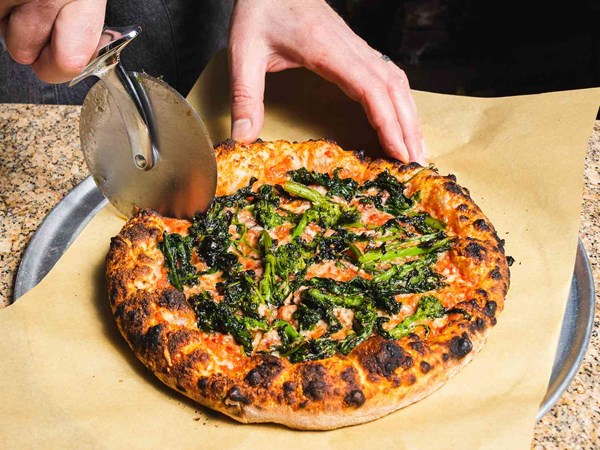 Broccoli rabe, pecorino, and anchovy pizza (for outdoor pizza ovens)