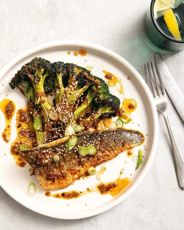 Broccoli steaks with crispy sea bass, five-spice potatoes and peanut & chilli sauce