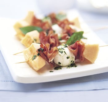 Brochettes of melon, prosciutto, and fresh mozzarella