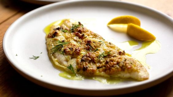 Broiled fish with lemon curry butter