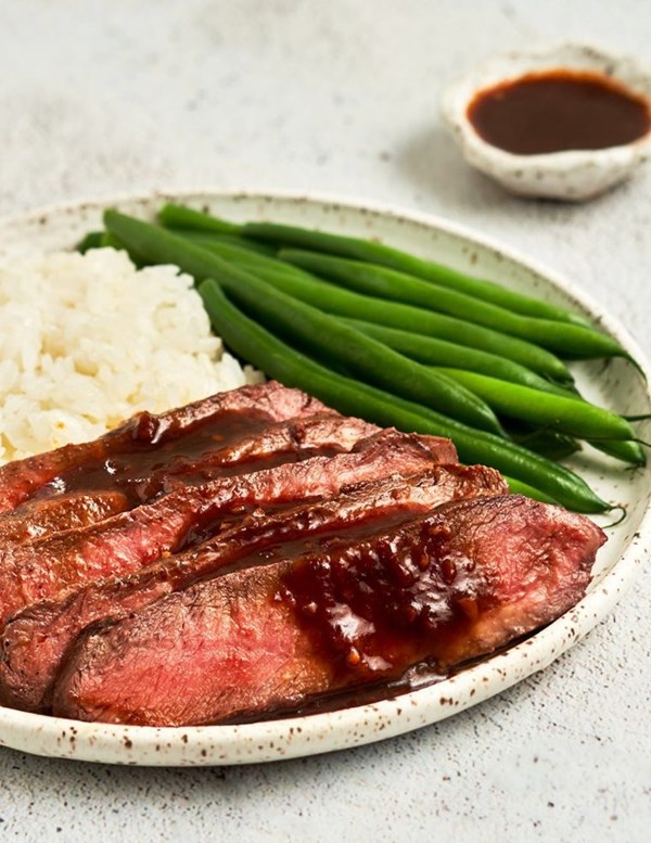 Broiled flat iron steak with soy ginger sauce