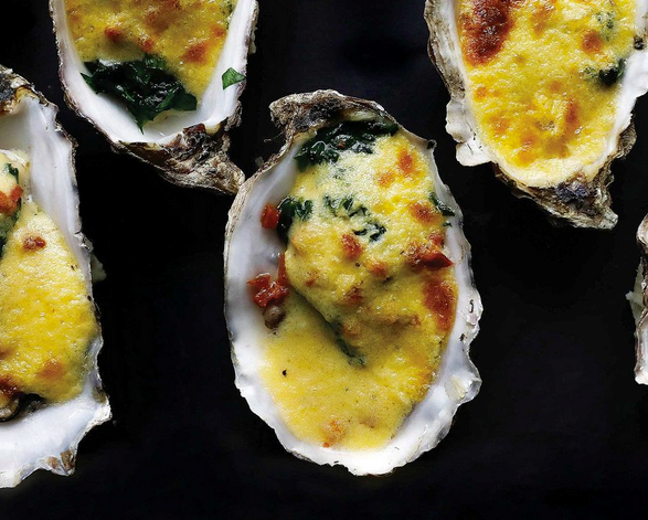 Broiled oysters with spinach and brown butter Hollandaise