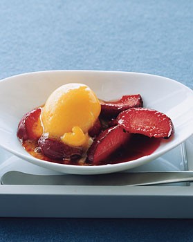 Broiled plums with mango sorbet