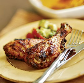 Broiled Tex-Mex drumsticks with avocado and tomato salad