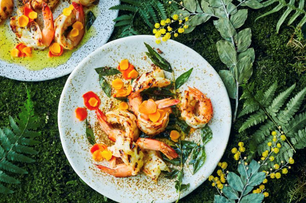 Brown butter chargrilled prawns with turmeric pickle