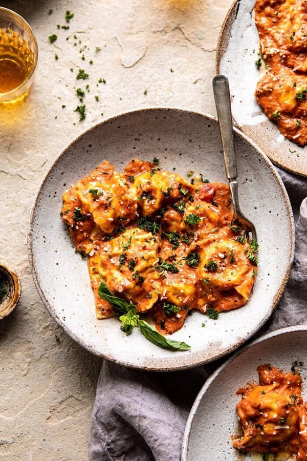 Brown butter lobster ravioli with tomato cream sauce