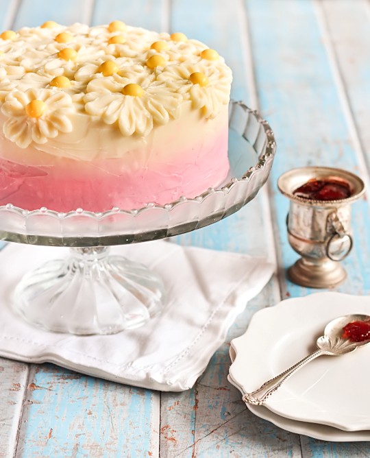 Brown butter pink ombre daisy cake with strawberry jam