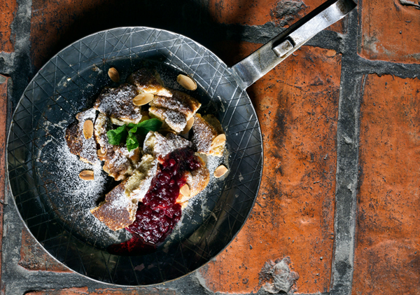 Brown butter skillet cake with berry compote (Kaiserschmarrn)