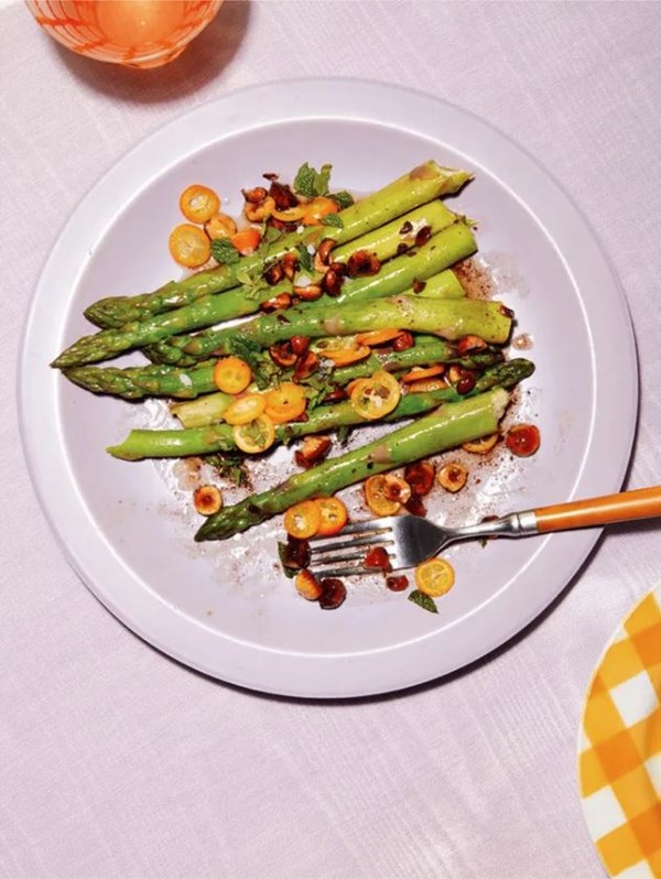 Brown-buttered asparagus with hazelnut and pickled kumquats