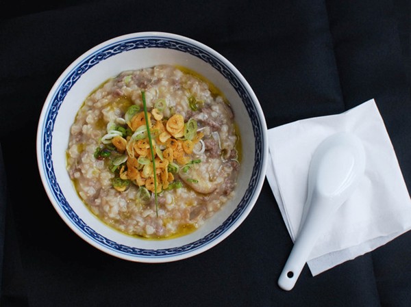 Brown rice congee with beef, shiitake, and garlic chips
