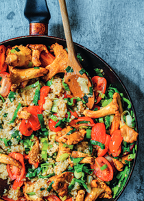 Brown rice pilaf with cherry tomatoes and chanterelles