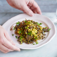 Brown rice pilaf with mushrooms, caramelised onions and yogurt