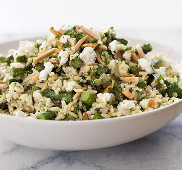 Brown rice salad with asparagus, goat cheese, and lemon