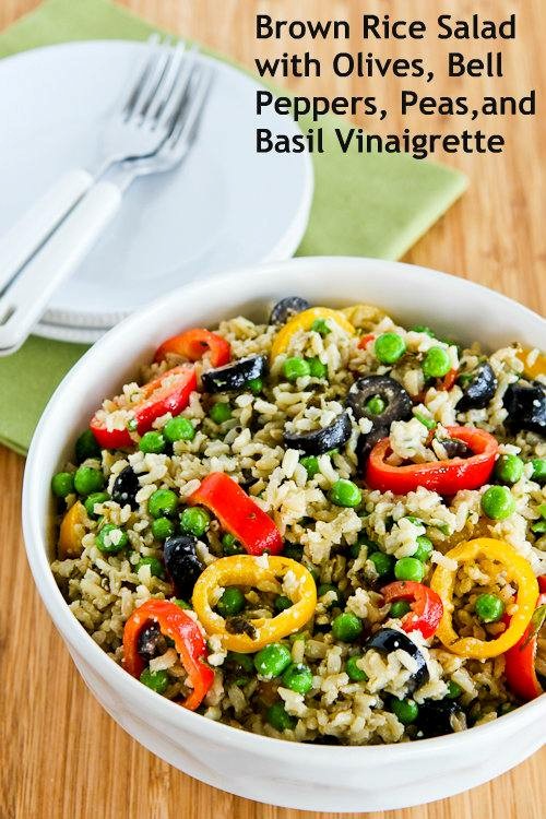 Brown rice salad with olives, bell peppers, peas, and basil vinaigrette