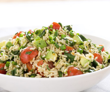 Brown rice salad with tomatoes, avocado, and jalapeño