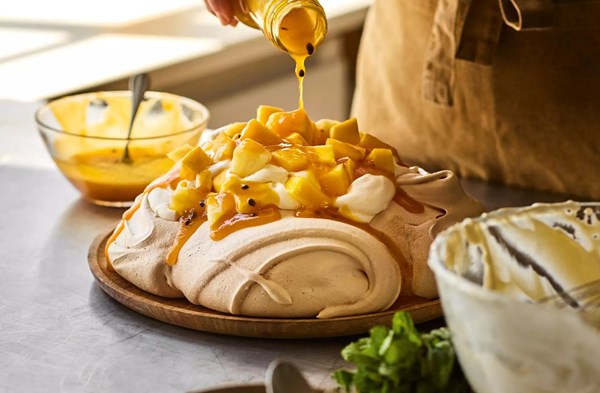 Brown sugar Pavlova with mango & pineapple