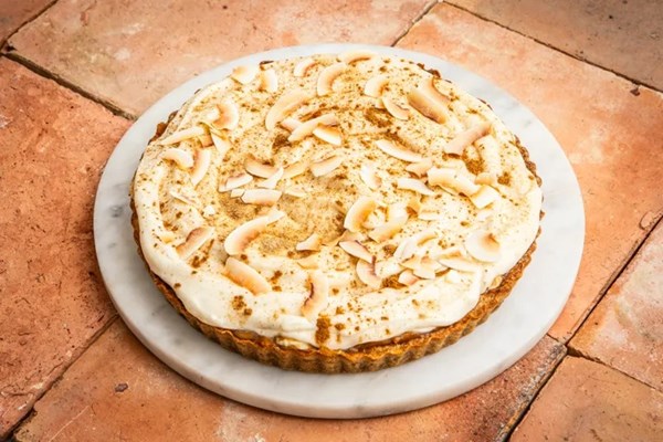 Brown sugar tart with sweet potato caramel, banana, and whipped coconut cream