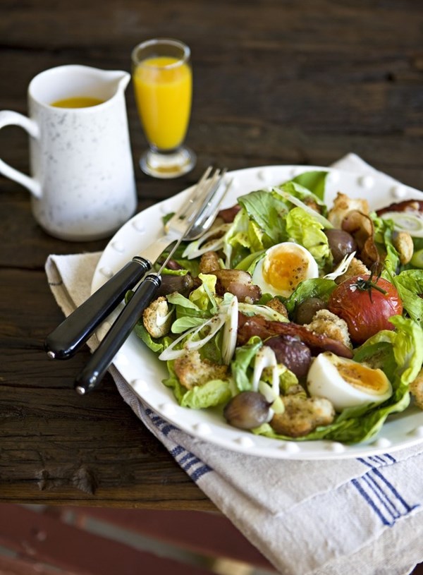 Brunch salad of roasted shallots, bacon, croutons and soft boiled eggs
