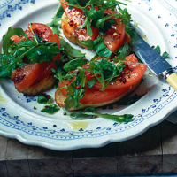 Bruschetta with tomato and rocket