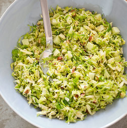 Brussels sprout salad with cheddar, hazelnuts, and apple