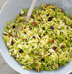 Brussels sprout salad with smoked Gouda, pecans, and dried cherries