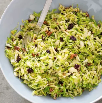 Brussels sprout salad with smoked Gouda, pecans, and dried cherries