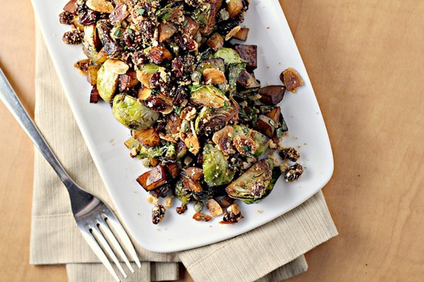 Brussels sprouts and potatoes with almonds, raisins, and capers