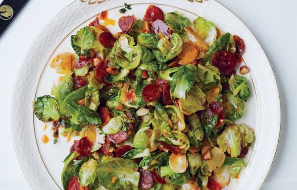 Brussels sprouts leaves with chorizo and toasted almonds