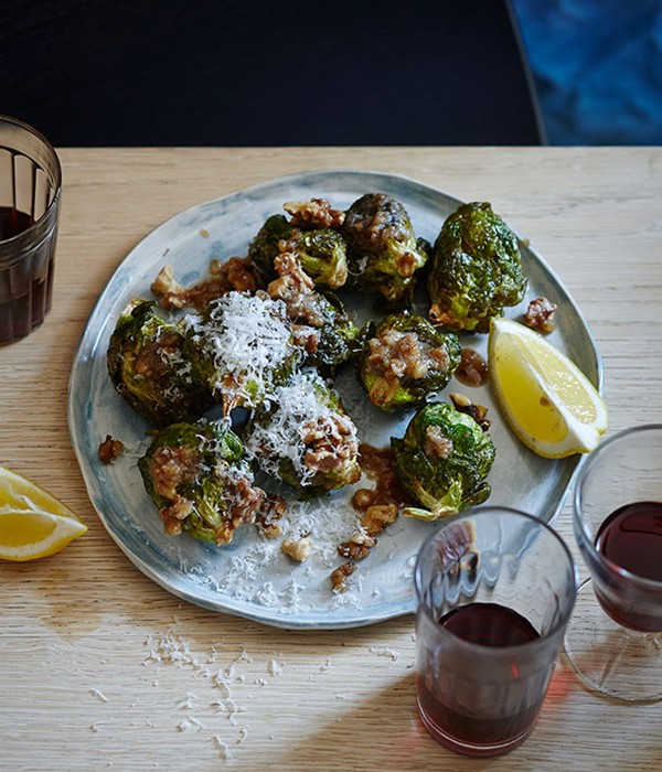 Brussels sprouts with walnut dressing, lemon and pecorino