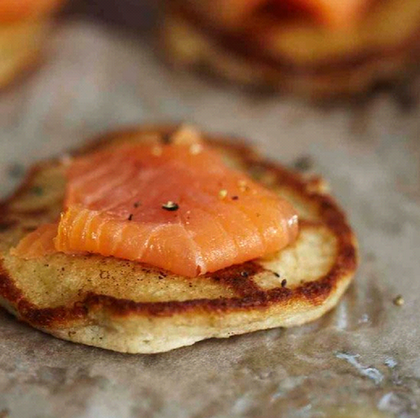 Buckwheat-cheddar blini with smoked salmon