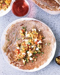 Buckwheat crêpes with corn, tomatoes and goat cheese