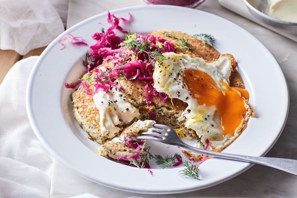 Buckwheat pancakes with sauerkraut and fried egg