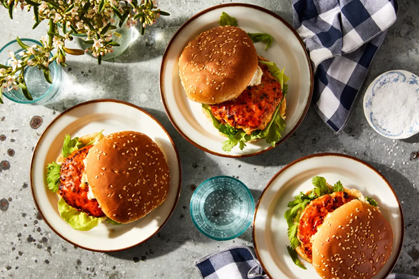 Buffalo chicken burgers with buttermilk blue cheese sauce