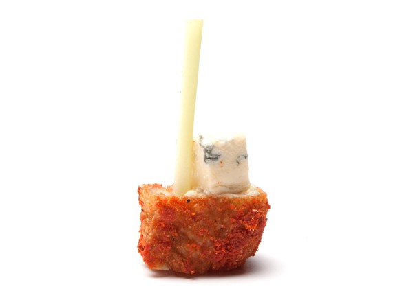 Buffalo chicken wings with celery and Cambozola blue