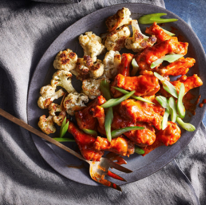 Buffalo chicken wings with ranchy cauliflower