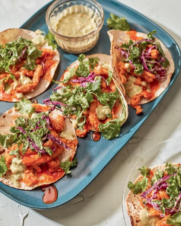 Buffalo chik'n tacos with kale & avocado-lime ranch slaw