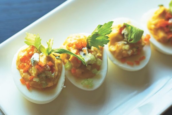 Buffalo deviled eggs with blue cheese